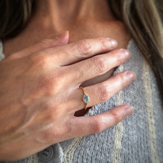 14k + Blue Topaz and Diamond East/West Ring